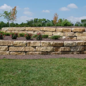 Explore how a Sandstone Retaining Wall can enhance your landscape